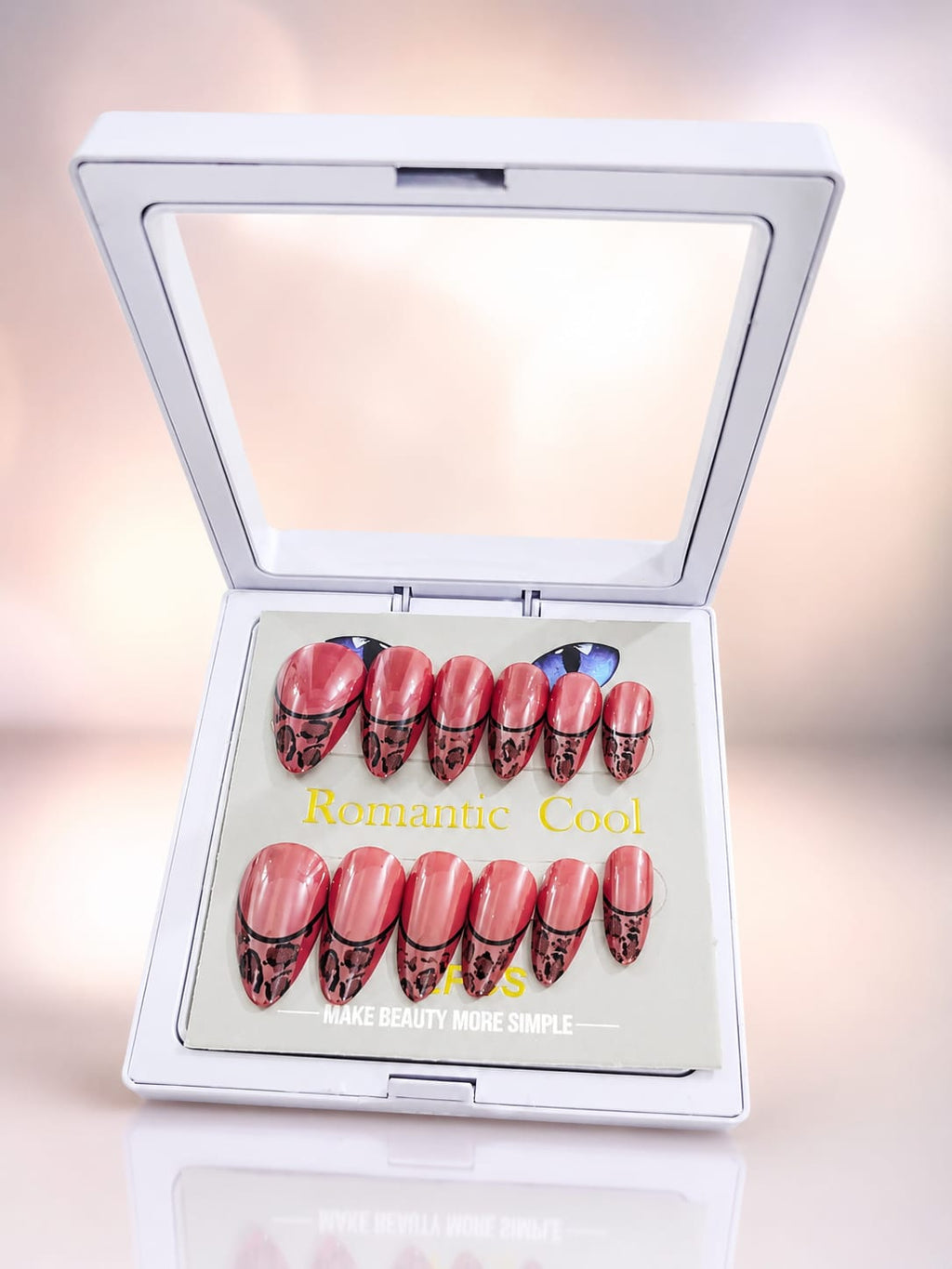 Romantic Cool press-on nails displayed in open compact case