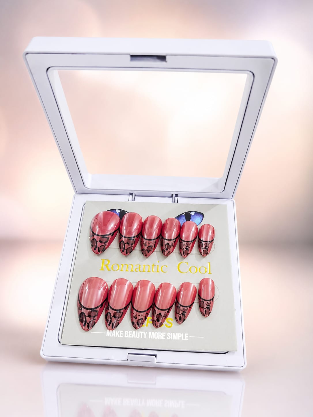 Romantic Cool press-on nails displayed in open compact case